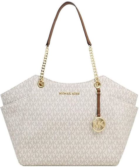 michael kors jet set chain large vanilla tote|Michael Kors bag with airplanes.